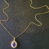 Tanzanite & baguette Diamond Pendant Necklacefrom Ace Jewellery, Leeds