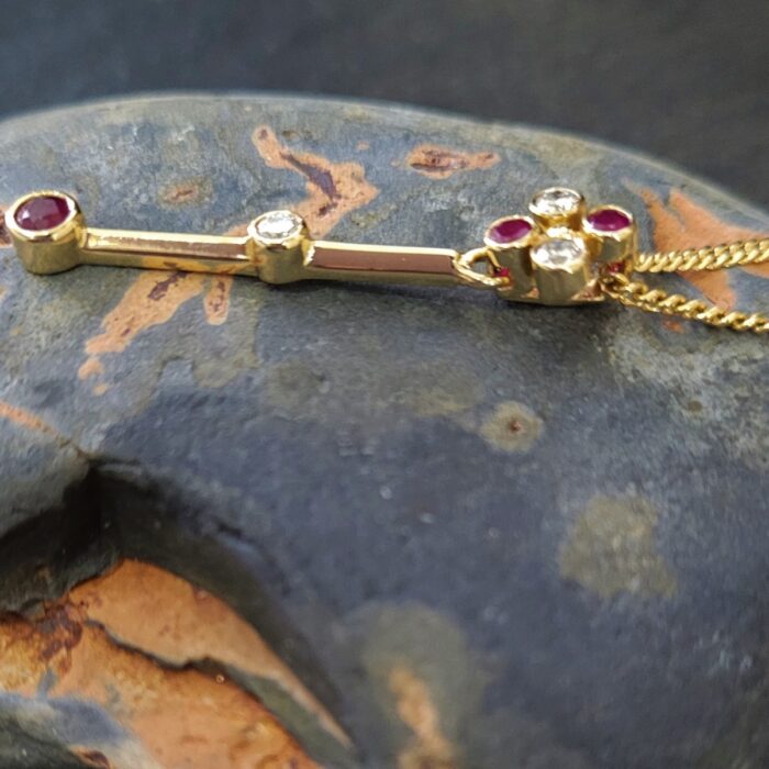 Yellow Gold Ruby & Diamond Pendant Necklace from Ace Jewellery, Leeds