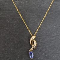 9ct Yellow Gold Tanzanite & Diamond Pendant Necklace from Ace Jewellery, Leeds