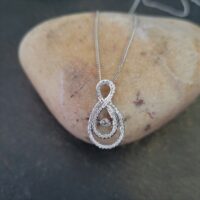 9ct White Gold Dance Diamond Infinity Pendant 0.50ct from Ace Jewellery, Leeds