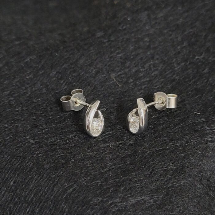 XXct White Gold 0.15ct Diamond Curve Stud Earrings from Ace Jewellery, Leeds