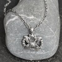 Georg Jensen Silver Flower Pendant Necklace from Ace Jewellery, Leeds