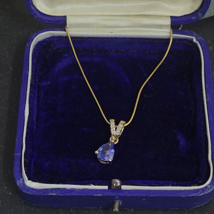 Tanzanite & Diamond Teardrop Pendant Necklace 9ct Yellow Gold from Ace Jewellery, Leeds