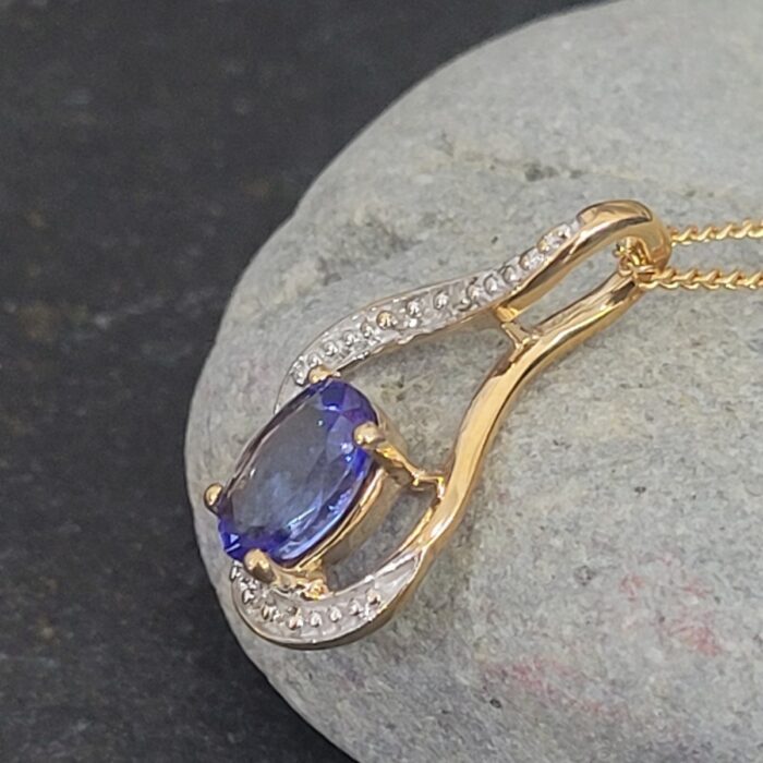 1.06ct Tanzanite & Diamond Swirl Pendant Necklace 9ct Yellow Gold from Ace Jewellery, Leeds