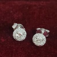 18ct White Gold 0.53ct Halo Diamond Stud Earrings from Ace Jewellery, Leeds