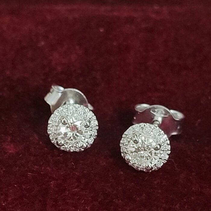 18ct White Gold 0.53ct Halo Diamond Stud Earrings from Ace Jewellery, Leeds