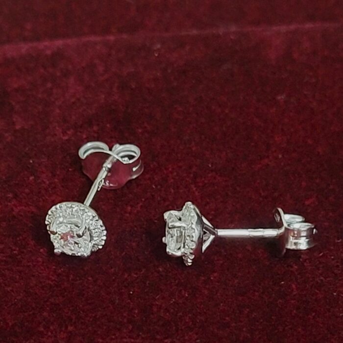 18ct White Gold 0.53ct Halo Diamond Stud Earrings from Ace Jewellery, Leeds
