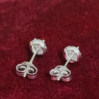 18ct White Gold 0.53ct Halo Diamond Stud Earrings from Ace Jewellery, Leeds