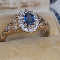 0.90ct Sapphire & Diamond Cluster Ring 9ct Yellow Gold from Ace Jewellery, Leeds
