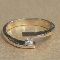 0.12ct Princess Cut Twist Diamond Ring 18ct Yellow Gold from Ace Jewellery, Leeds
