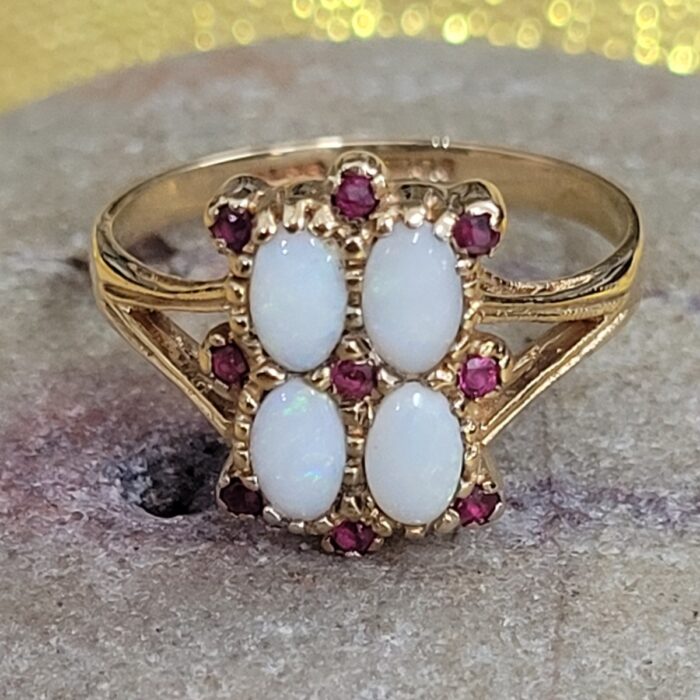 1.58ct Opal & Ruby Ring 9ct Yellow Gold from Ace Jewellery, Leeds