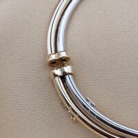 9ct Yellow Gold & 9ct White Gold Multi-Metal Twist Bangle from Ace Jewellery, Leeds