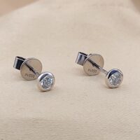 Platinum 0.29ct Collet-Set Diamond Solitaire Stud Earrings from Ace Jewellery, Leeds