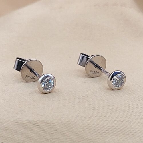 Platinum 0.29ct Collet-Set Diamond Solitaire Stud Earrings from Ace Jewellery, Leeds