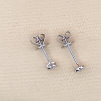 Platinum 0.29ct Collet-Set Diamond Solitaire Stud Earrings from Ace Jewellery, Leeds