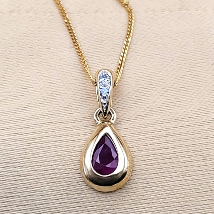 0.54ct Pear-Shaped Ruby & Diamond Teardrop Pendant Necklace 9ct Yellow Gold from Ace Jewellery, Leeds