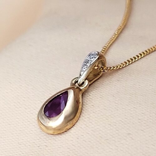 0.54ct Pear-Shaped Ruby & Diamond Teardrop Pendant Necklace 9ct Yellow Gold from Ace Jewellery, Leeds