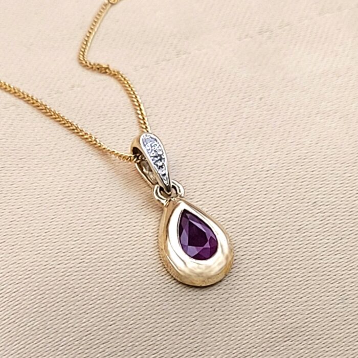 0.54ct Pear-Shaped Ruby & Diamond Teardrop Pendant Necklace 9ct Yellow Gold from Ace Jewellery, Leeds