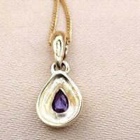 0.54ct Pear-Shaped Ruby & Diamond Teardrop Pendant Necklace 9ct Yellow Gold from Ace Jewellery, Leeds