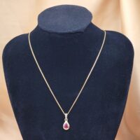 0.54ct Pear-Shaped Ruby & Diamond Teardrop Pendant Necklace 9ct Yellow Gold from Ace Jewellery, Leeds