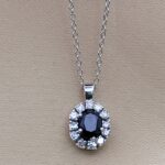 9ct White Gold 1.35ct Sapphire & Diamond Cluster Pendant Necklace from Ace Jewellery, Leeds