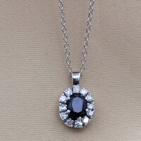 9ct White Gold 1.35ct Sapphire & Diamond Cluster Pendant Necklace from Ace Jewellery, Leeds