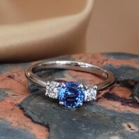 1.1ct Sapphire & Diamond Three-Stone Ring Platinum from Ace Jewellery, Leeds