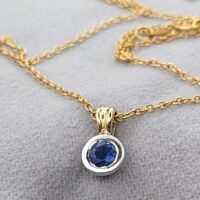 0.35ct Sapphire Collet-Set Pendant Necklace 9ct Yellow Gold from Ace Jewellery, Leeds