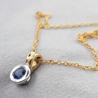 0.35ct Sapphire Collet-Set Pendant Necklace 9ct Yellow Gold from Ace Jewellery, Leeds