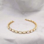 Vintage Style Opal Tennis Bracelet 9ct Yellow Gold from Ace Jewellery, Leeds