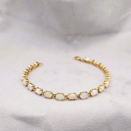 Vintage Style Opal Tennis Bracelet 9ct Yellow Gold from Ace Jewellery, Leeds