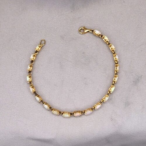 Vintage Style Opal Tennis Bracelet 9ct Yellow Gold from Ace Jewellery, Leeds