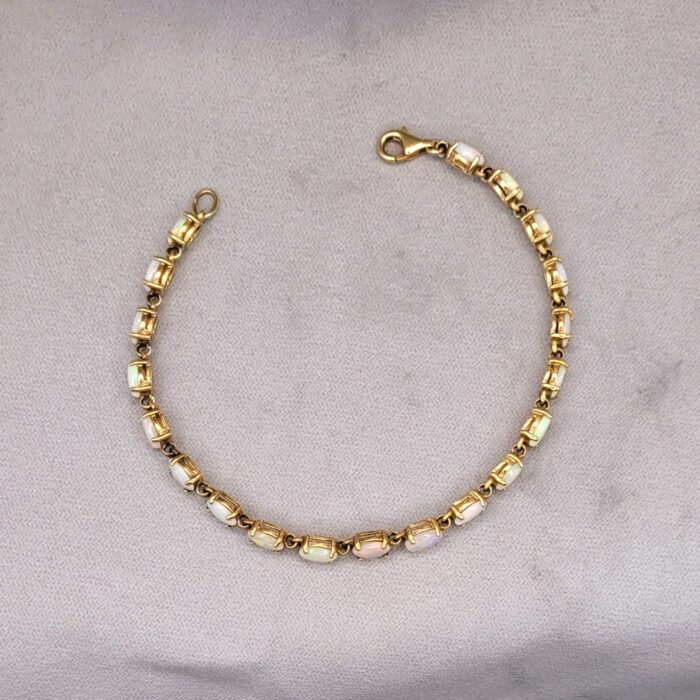 Vintage Style Opal Tennis Bracelet 9ct Yellow Gold from Ace Jewellery, Leeds