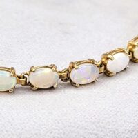 Vintage Style Opal Tennis Bracelet 9ct Yellow Gold from Ace Jewellery, Leeds
