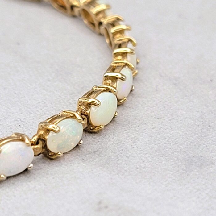 Vintage Style Opal Tennis Bracelet 9ct Yellow Gold from Ace Jewellery, Leeds