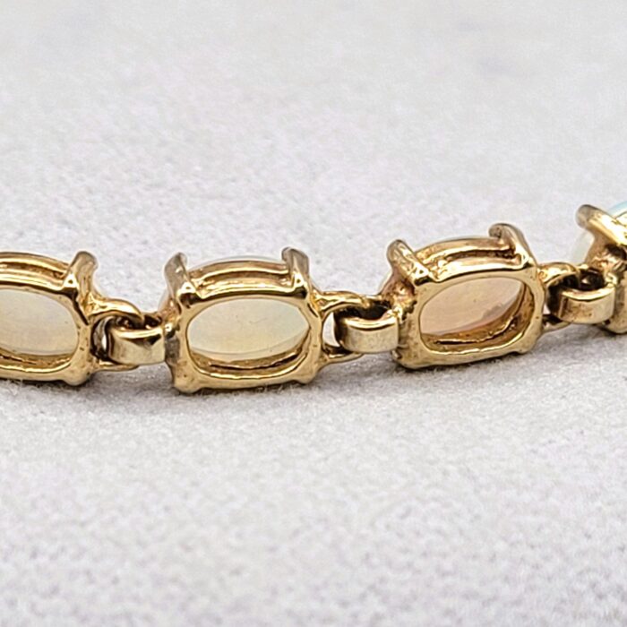 Vintage Style Opal Tennis Bracelet 9ct Yellow Gold from Ace Jewellery, Leeds