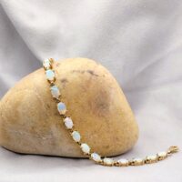 Vintage Style Opal Tennis Bracelet 9ct Yellow Gold from Ace Jewellery, Leeds