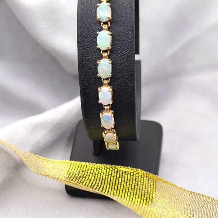 Vintage Style Opal Tennis Bracelet 9ct Yellow Gold from Ace Jewellery, Leeds