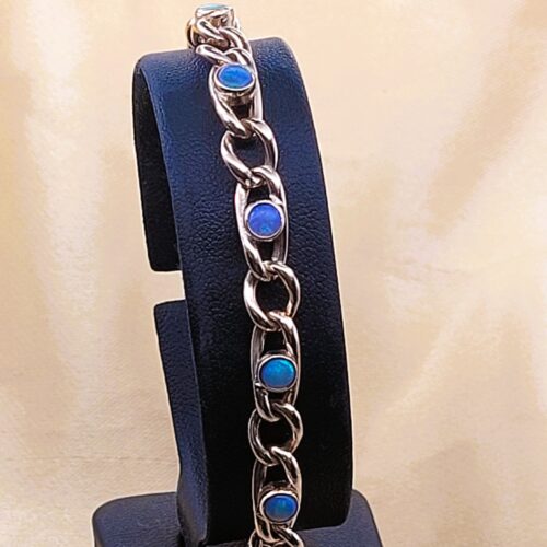 1.5ct Opal Curb Link Bracelet 9ct Rose Gold from Ace Jewellery, Leeds