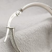 9ct White Gold Glitter Effect Hoop Earrings from Ace Jewellery, Leeds