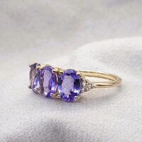 2.35ct Tanzanite & White Topaz Ring 9ct Yellow Gold from Ace jewellery, Leeds