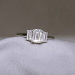 0.94ct Emerald Cut Diamond Three-Stone Engagement Ring Platinum from Ace Jewellery, Leeds