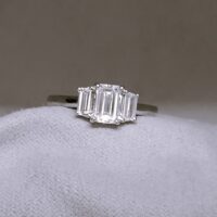 0.94ct Emerald Cut Diamond Three-Stone Engagement Ring Platinum from Ace Jewellery, Leeds