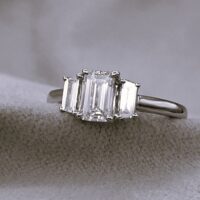 0.94ct Emerald Cut Diamond Three-Stone Engagement Ring Platinum from Ace Jewellery, Leeds