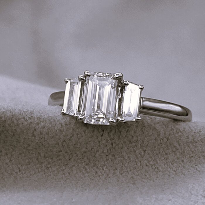 0.94ct Emerald Cut Diamond Three-Stone Engagement Ring Platinum from Ace Jewellery, Leeds