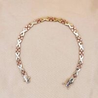 9ct Yellow & Rose Gold Kisses Bracelet from Ace Jewellery, Leeds