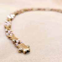 9ct Yellow & Rose Gold Kisses Bracelet from Ace Jewellery, Leeds