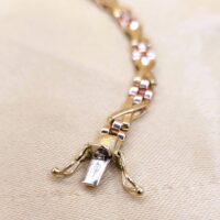 9ct Yellow & Rose Gold Kisses Bracelet from Ace Jewellery, Leeds