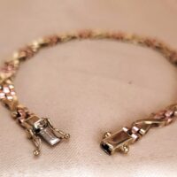 9ct Yellow & Rose Gold Kisses Bracelet from Ace Jewellery, Leeds
