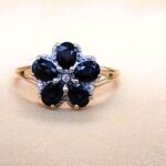 1.265ct Sapphire & Diamond Daisy Cluster Ring 9ct Yellow Gold from Ace Jewellery, Leeds